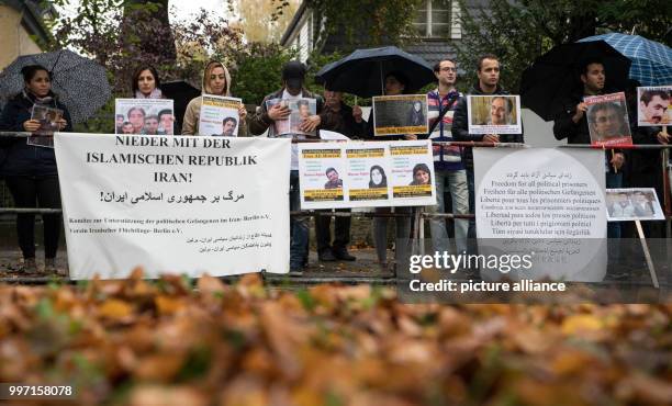 Small group of demonstrators protest against the execution of political prisoners in Iran in front of the nation's embassy in Berlin, Germany, 10...