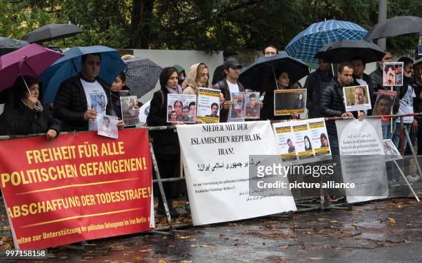 Small group of demonstrators protest against the execution of political prisoners in Iran in front of the nation's embassy in Berlin, Germany, 10...