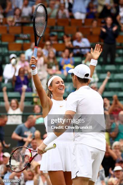 Jamie Murray of Great Britain and Victoria Azarenka of Belarus celebrate match point against Jean-Julien Rojer and Demi Schuurs of The Netherlands...