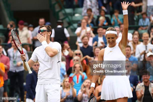 Jamie Murray of Great Britain and Victoria Azarenka of Belarus celebrate match point against Jean-Julien Rojer and Demi Schuurs of The Netherlands...