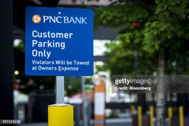 Customer Parking Only" sign stands on display outside a PNC Financial Services Group Inc. Bank branch in Chicago, Illinois, U.S., on Thursday, July...