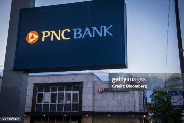 Signage is displayed outside a PNC Financial Services Group Inc. Bank branch in Chicago, Illinois, U.S., on Tuesday, July 10, 2018. PNC Financial...