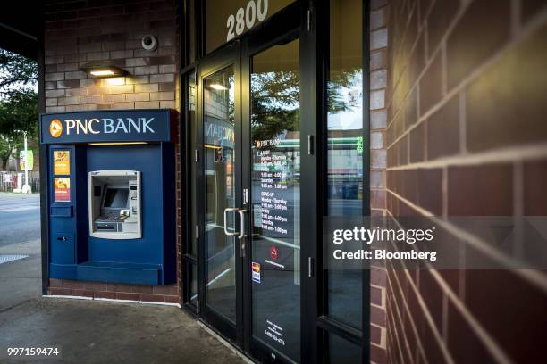 An automatic teller machine stands outside a PNC Financial Services Group Inc. Bank branch in Chicago, Illinois, U.S., on Thursday, July 12, 2018....