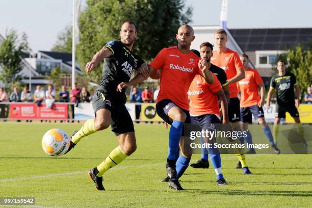 Ron Vlaar of AZ Alkmaar, Reguilio van de Pitte of Zeeuws elftal during the Club Friendly match between Zeeuws Elftal v AZ Alkmaar at the Sportpark...