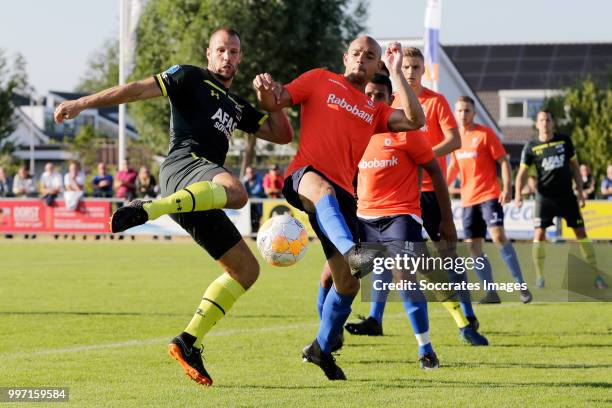 Ron Vlaar of AZ Alkmaar, Reguilio van de Pitte of Zeeuws elftal during the Club Friendly match between Zeeuws Elftal v AZ Alkmaar at the Sportpark...