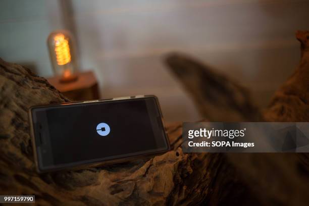 In this photo illustration, the Uber application seen displayed on a Sony smartphone.