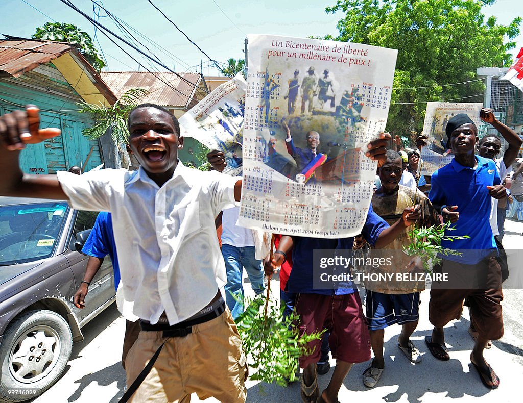 Haitians demonstrate on May 17, 2010 aga