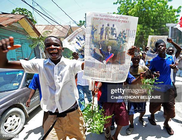 Haitians demonstrate on May 17, 2010 against President Rene Preval's decision to extend his presidential mandate by three months to May 14, 2011....