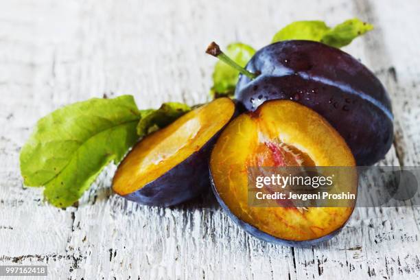 ripe tasty plums - theobroma foto e immagini stock