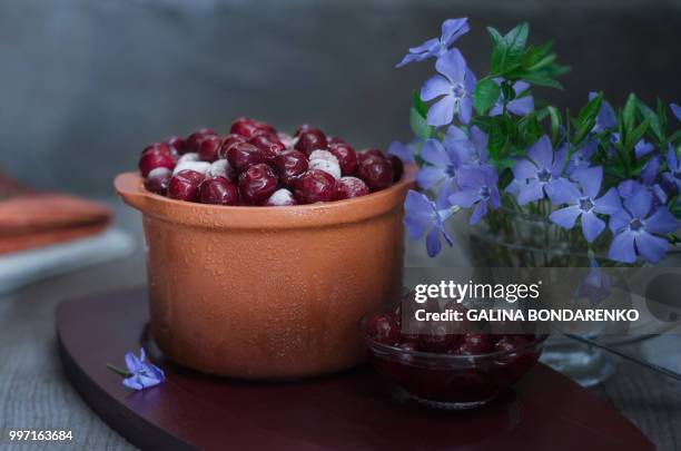 frozen cherries in a pot, and cherry jam - cherry jam stock pictures, royalty-free photos & images