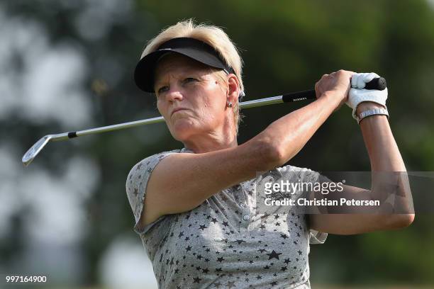 Trish Johnson of England plays a tee shot on the seventh hole during the first round of the U.S. Senior Women's Open at Chicago Golf Club on July 12,...