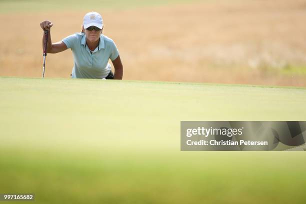 Helen Alfredsson of Sweden looks over the seventh green during the first round of the U.S. Senior Women's Open at Chicago Golf Club on July 12, 2018...