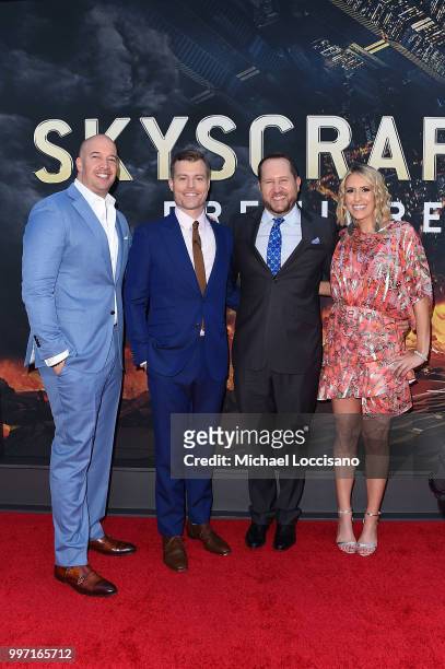Hiram Garcia, Rawson Marshall Thurber, Beau Flynn and Wendy Jacobson attend the 'Skyscraper' New York Premiere at AMC Loews Lincoln Square on July...