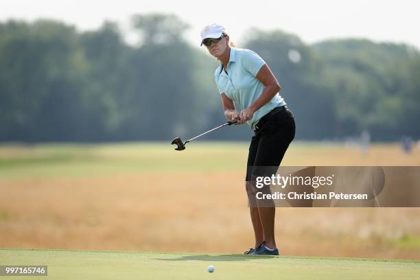 Helen Alfredsson of Sweden putts on the seventh green during the first round of the U.S. Senior Women's Open at Chicago Golf Club on July 12, 2018 in...