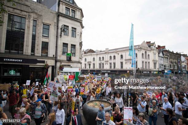 Protesters gather on Queen Street in Cardiff to protest against a visit by U.S. President Donald Trump on July 12, 2018 in Cardiff, United Kingdom....