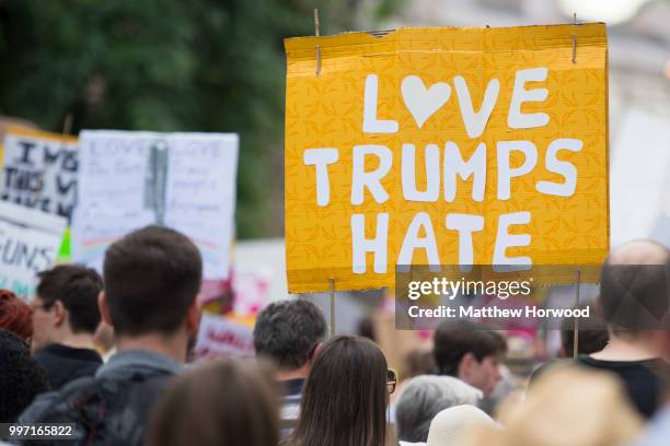 Anti Donald Trump signs are seen as protesters gather outside Cardiff Library on the Hayes in Cardiff to protest against a visit by U.S. President...