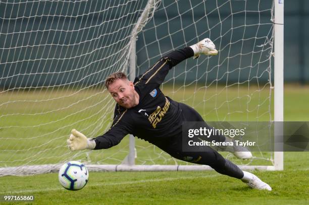 Goalkeeper Rob Elliot saves the ball during the Newcastle United Training session at Carton House on July 12 in Kildare, Ireland.