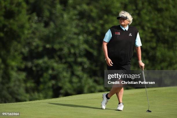 Laura Davies of England stands on the seventh green during the first round of the U.S. Senior Women's Open at Chicago Golf Club on July 12, 2018 in...