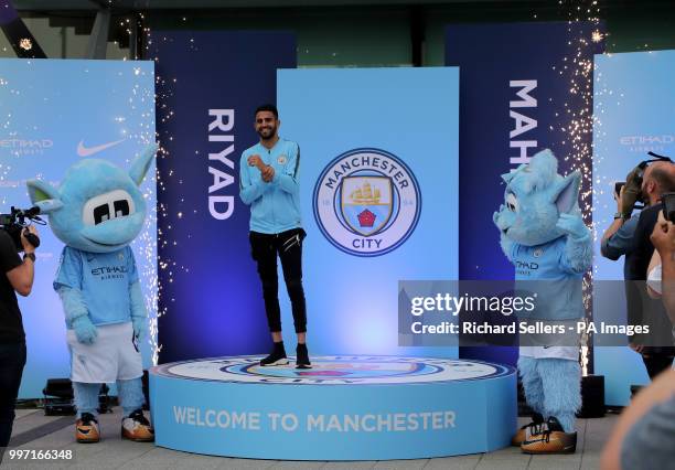 New Manchester City signing Riyad Mahrez greets fans at the Etihad Stadium, Manchester.