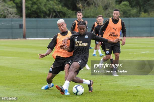 Rolando Aarons controls the ball whilst being challenged by Kenedy during the Newcastle United Training session at Carton House on July 12 in...