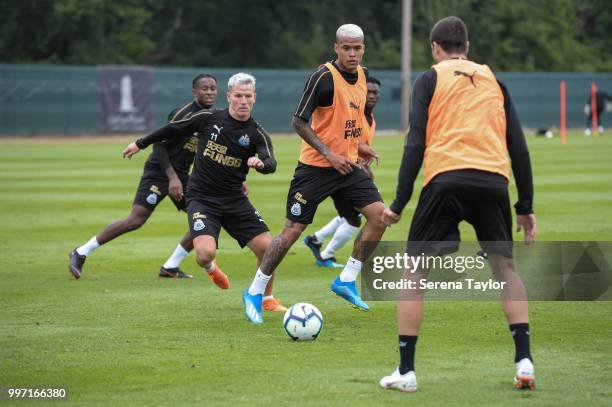 Kenedy looks to control the ball whilst Matt Ritchie; looks to challenge during the Newcastle United Training session at Carton House on July 12 in...