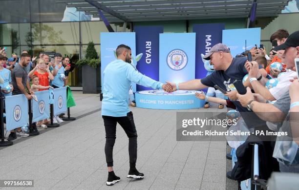 New Manchester City signing Riyad Mahrez greets fans at the Etihad Stadium, Manchester.