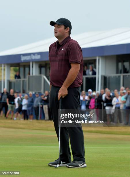 Patrick Reed of USA reacts at the 18th green during the first day of the Aberdeen Standard Investments Scottish Open at Gullane Golf Course on July...
