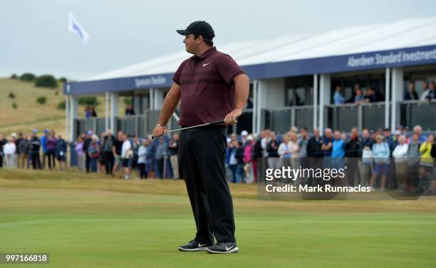 Patrick Reed of USA looks on at the 18th green during the first day of the Aberdeen Standard Investments Scottish Open at Gullane Golf Course on July...