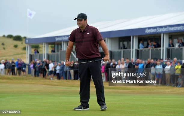 Patrick Reed of USA looks on at the 18th green during the first day of the Aberdeen Standard Investments Scottish Open at Gullane Golf Course on July...