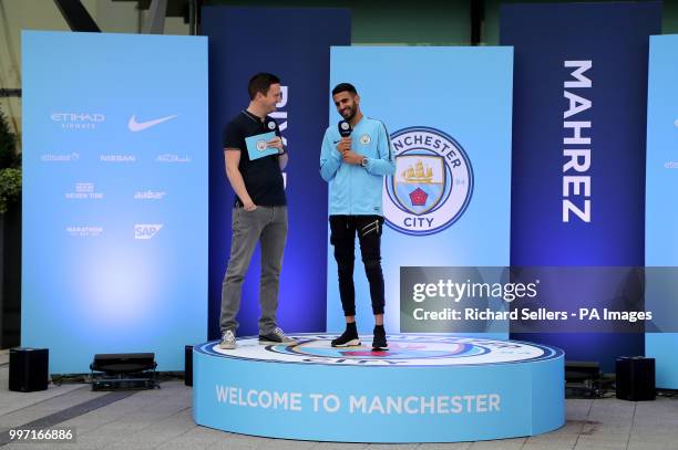 New Manchester City signing Riyad Mahrez greets fans at the Etihad Stadium, Manchester.