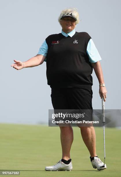 Laura Davies of Englad reacts to a missed putt on the seventh green during the first round of the U.S. Senior Women's Open at Chicago Golf Club on...