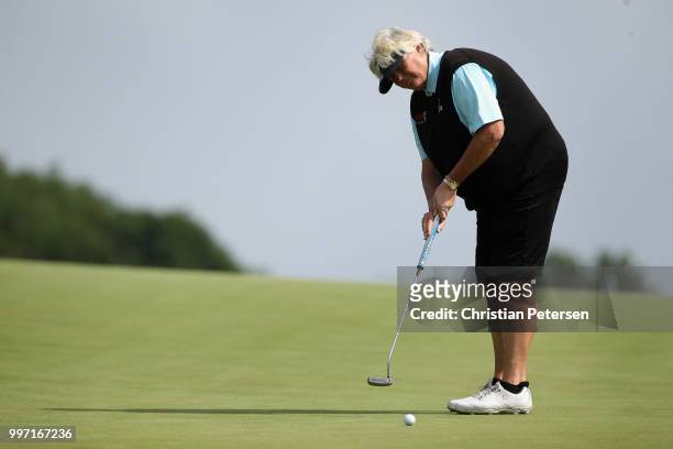 Laura Davies of England putts on the seventh green during the first round of the U.S. Senior Women's Open at Chicago Golf Club on July 12, 2018 in...