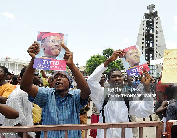 Haitians demonstrate near the presidential palace in Port-au-Prince on May 17, 2010 against President Rene Preval's decision to extend his...