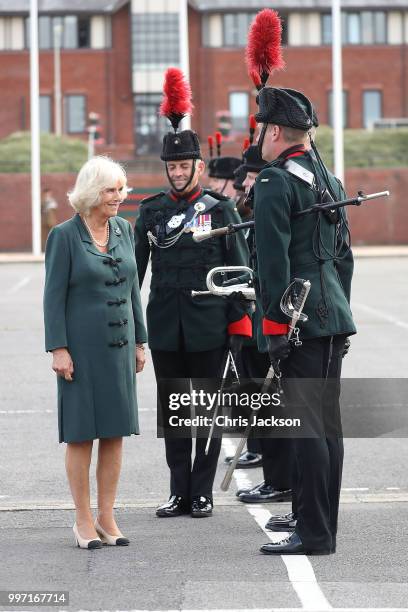 Camilla, Duchess of Cornwall attends a Medal Parade as she visits the New Normandy Barracks on July 12, 2018 in Aldershot, England.