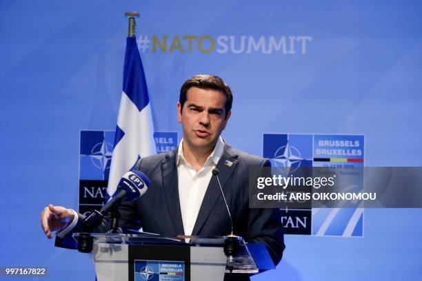 Greek Prime Minister, Alexis Tsipras, gives a press conference at the end of the second day of the NATO Summit and a bilateral meeting with Turkish...