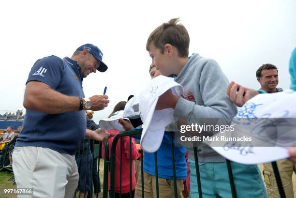 Lee Westwood of England signs autographs at the 18th during the first day of the Aberdeen Standard Investments Scottish Open at Gullane Golf Course...