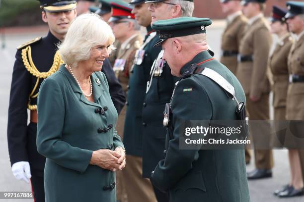 Camilla, Duchess of Cornwall attends a Medal Parade as she visits the New Normandy Barracks on July 12, 2018 in Aldershot, England.