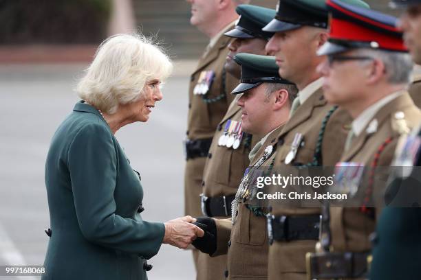 During a ALDERSHOT, ENGLAND Camilla, Duchess of Cornwall attends a Medal Parade as she visits the New Normandy Barracks on July 12, 2018 in...