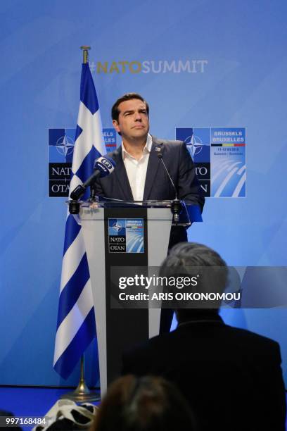 Greek Prime Minister, Alexis Tsipras, gives a press conference at the end of the second day of the NATO Summit and a bilateral meeting with Turkish...