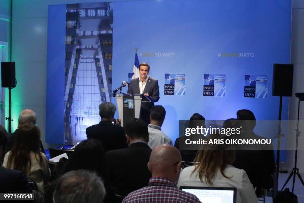 Greek Prime Minister, Alexis Tsipras, gives a press conference at the end of the second day of the NATO Summit and a bilateral meeting with Turkish...