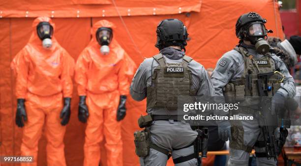 Heavily weaponized police officers can be seen during a police exercise for terror attacks with bio weaponry in Berlin, Germany, 11 October 2017....