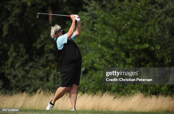 Laura Davies of England plays her second shot on the eighth hole during the first round of the U.S. Senior Women's Open at Chicago Golf Club on July...