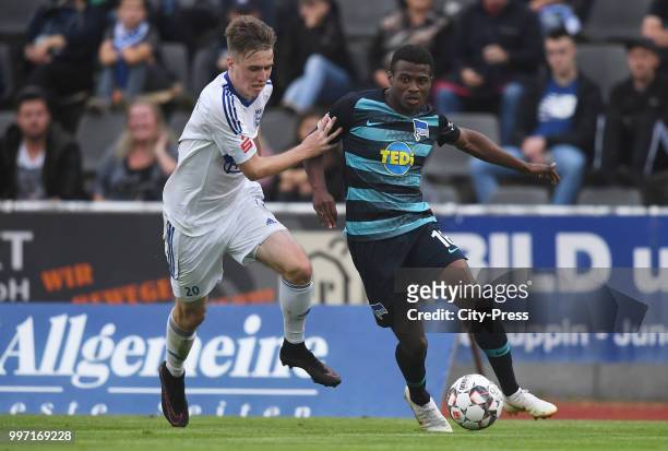 Tobias Voelkel of MSV Neuruppin and Javairo Dilrosun of Hertha BSC during the game between MSV Neuruppin against Hertha BSC at the Volkspar-Stadion...