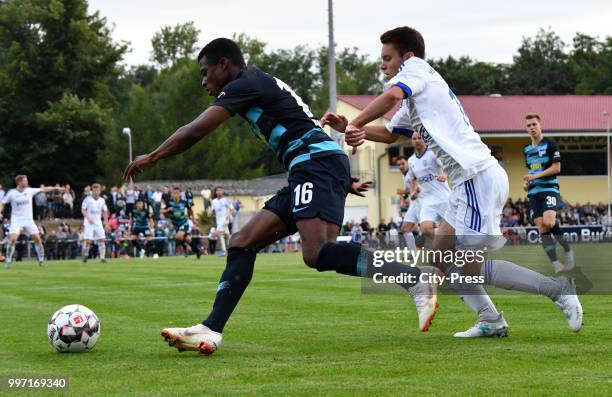 Javairo Dilrosun of Hertha BSC and Leon Mewes of MSV Neuruppin during the game between MSV Neuruppin against Hertha BSC at the Volkspar-Stadion on...