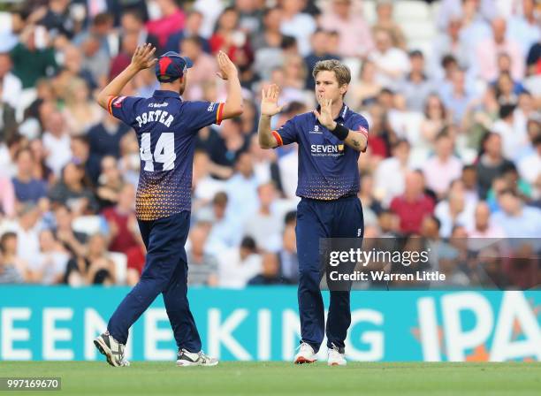 Adam, Zampa of Essex Eagles celebrates catching Aaron Finch of Surrey during the Vitality Blast match between Surrey and Essex Eagles at The Kia Oval...