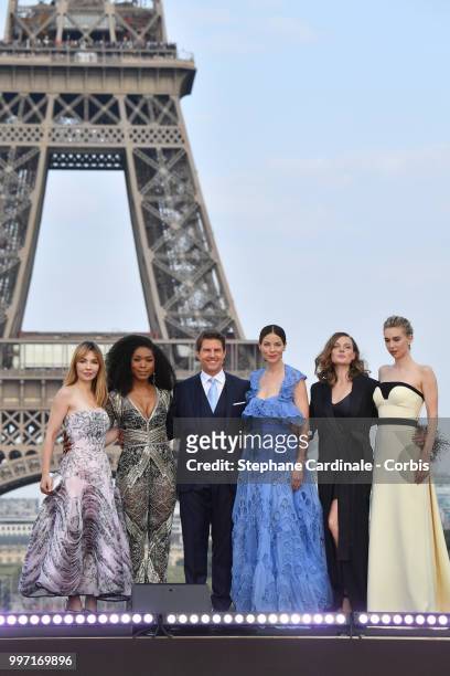 Actresses Alix Benezech, Angela Bassett, Actor and Producer Tom Cruise, Actresses Michelle Monaghan, Rebecca Ferguson and Vanessa Kirby pose in front...