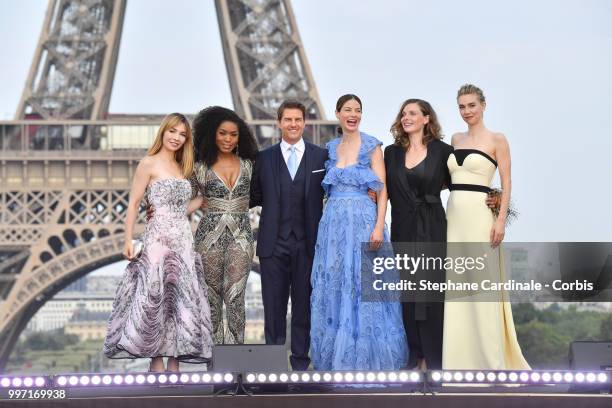 Actresses Alix Benezech, Angela Bassett, Actor and Producer Tom Cruise, Actresses Michelle Monaghan, Rebecca Ferguson and Vanessa Kirby pose in front...