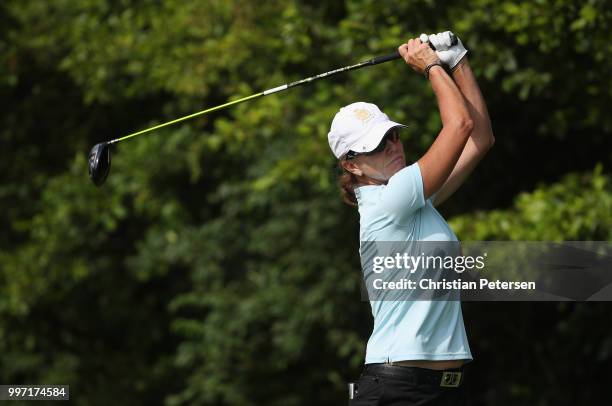 Helen Alfredsson of Sweden plays a tee shot on the eighth hole during the first round of the U.S. Senior Women's Open at Chicago Golf Club on July...