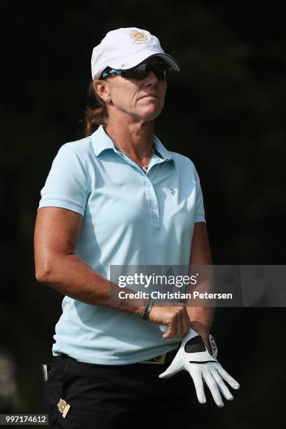 Helen Alfredsson of Sweden prepares to play a tee shot on the eighth hole during the first round of the U.S. Senior Women's Open at Chicago Golf Club...