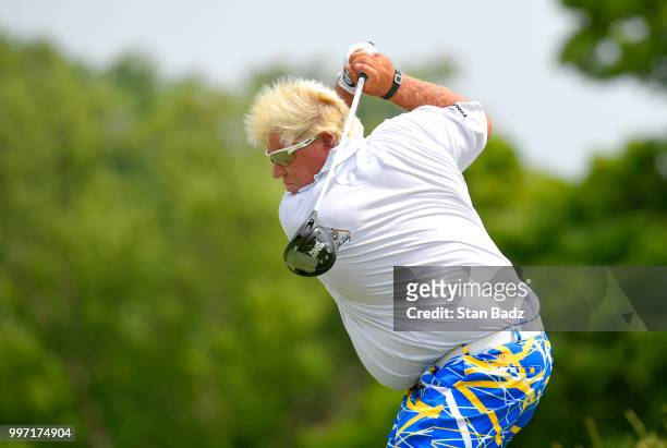 John Daly plays a tee shot on the third hole during the first round of the PGA TOUR Champions Constellation SENIOR PLAYERS Championship at Exmoor...